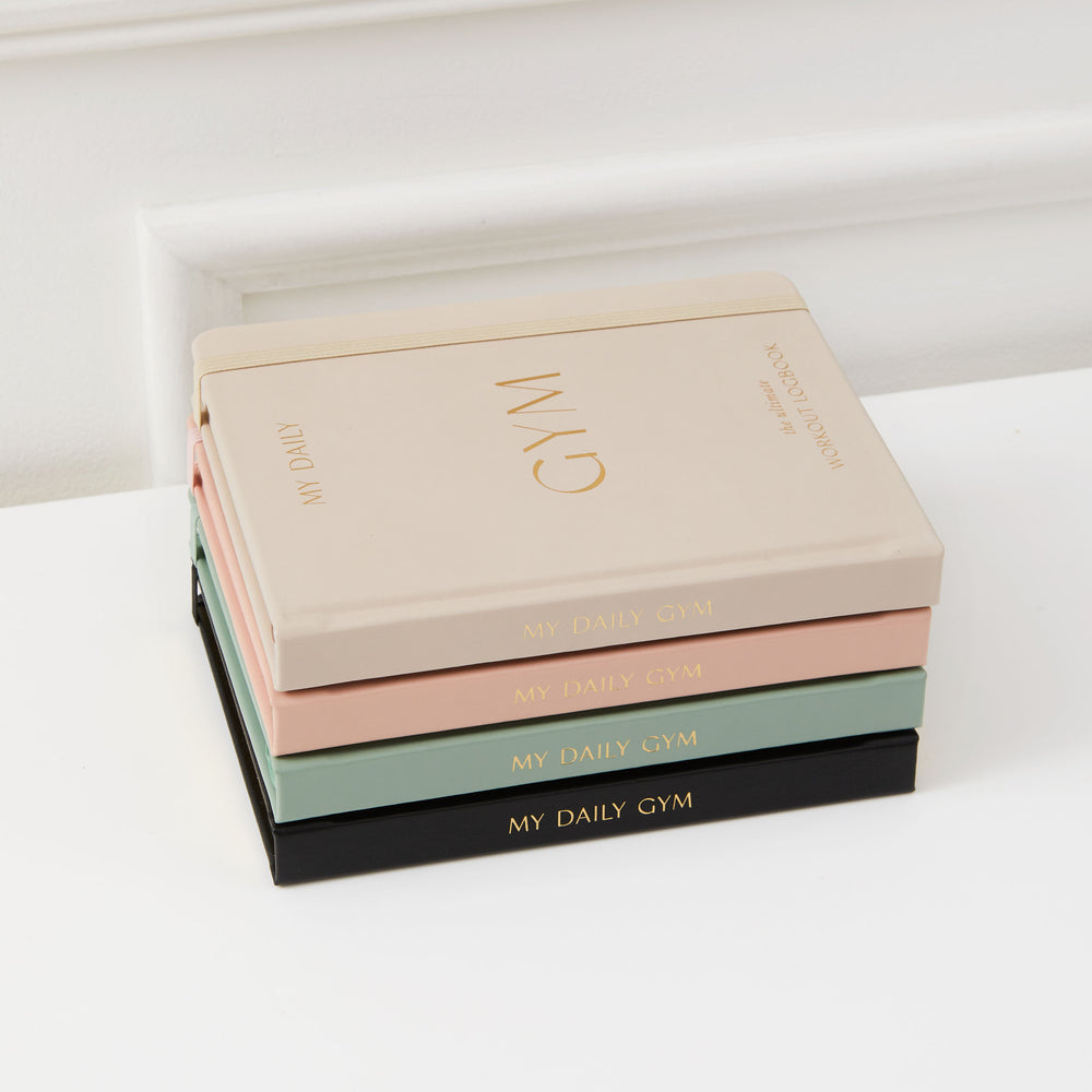 Fitness tracker and progress journal in beige colour