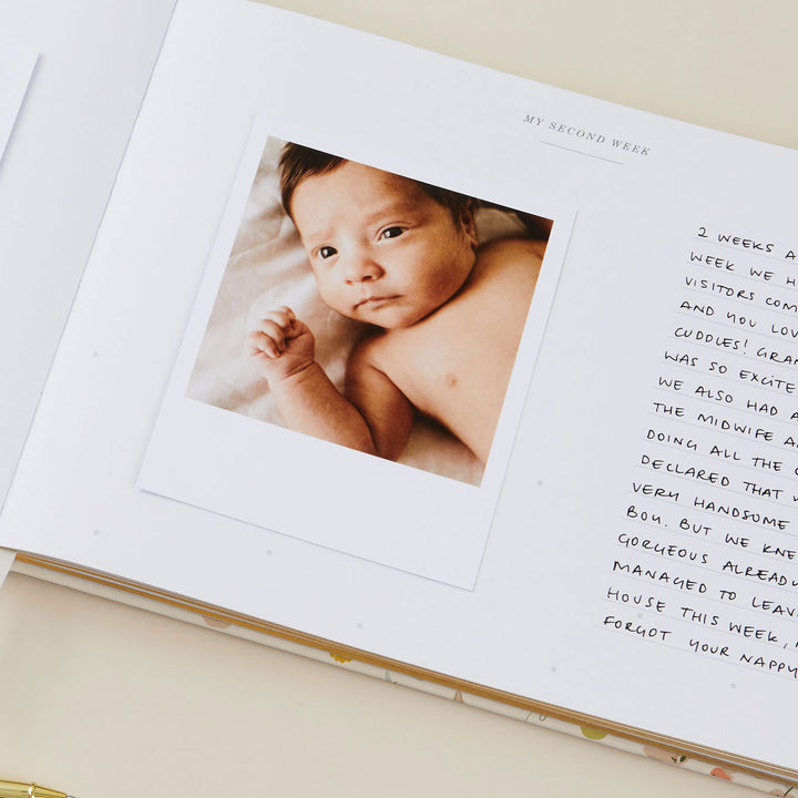 Gender-neutral baby memory book featuring minimalist design