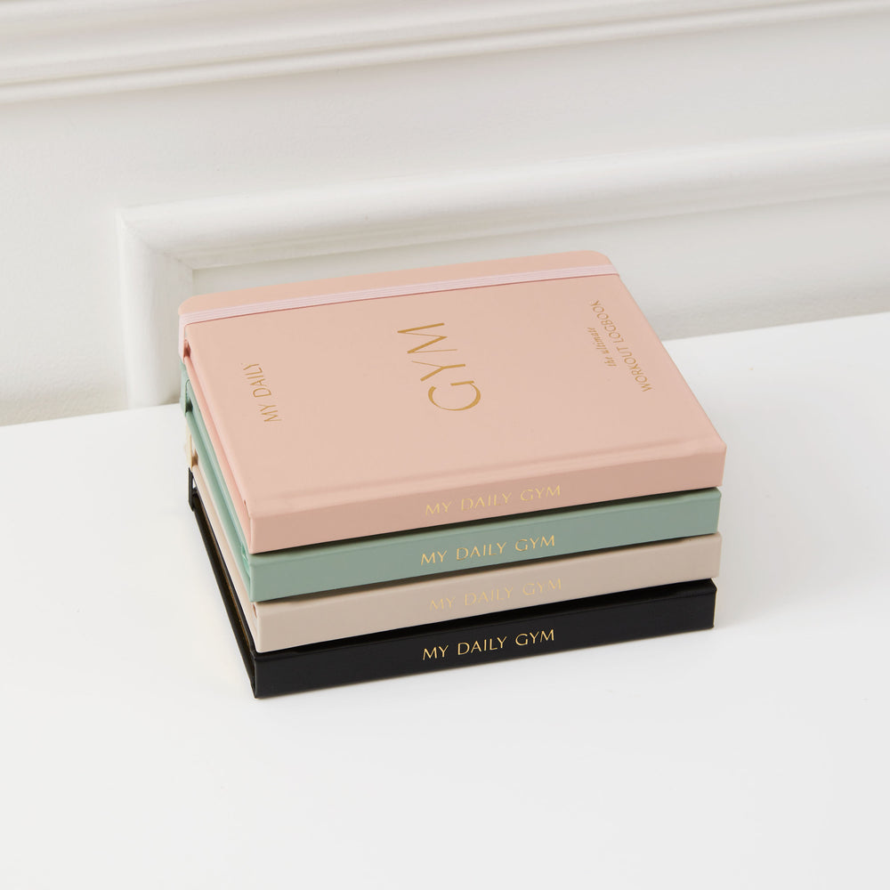 Blush pink fitness tracker and gym planner