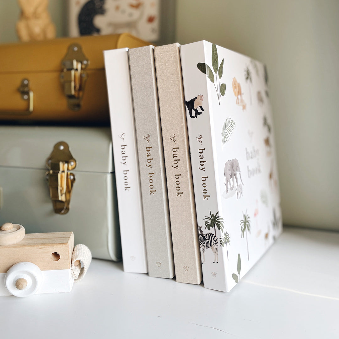 Elegant baby record book 5 years on a white background