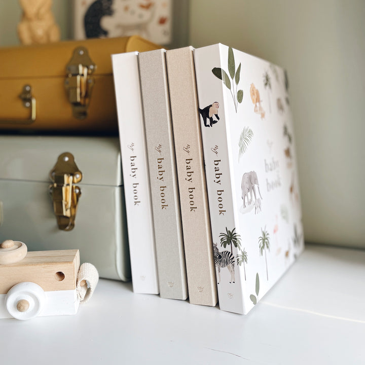 Elegant baby record book 5 years on a white background