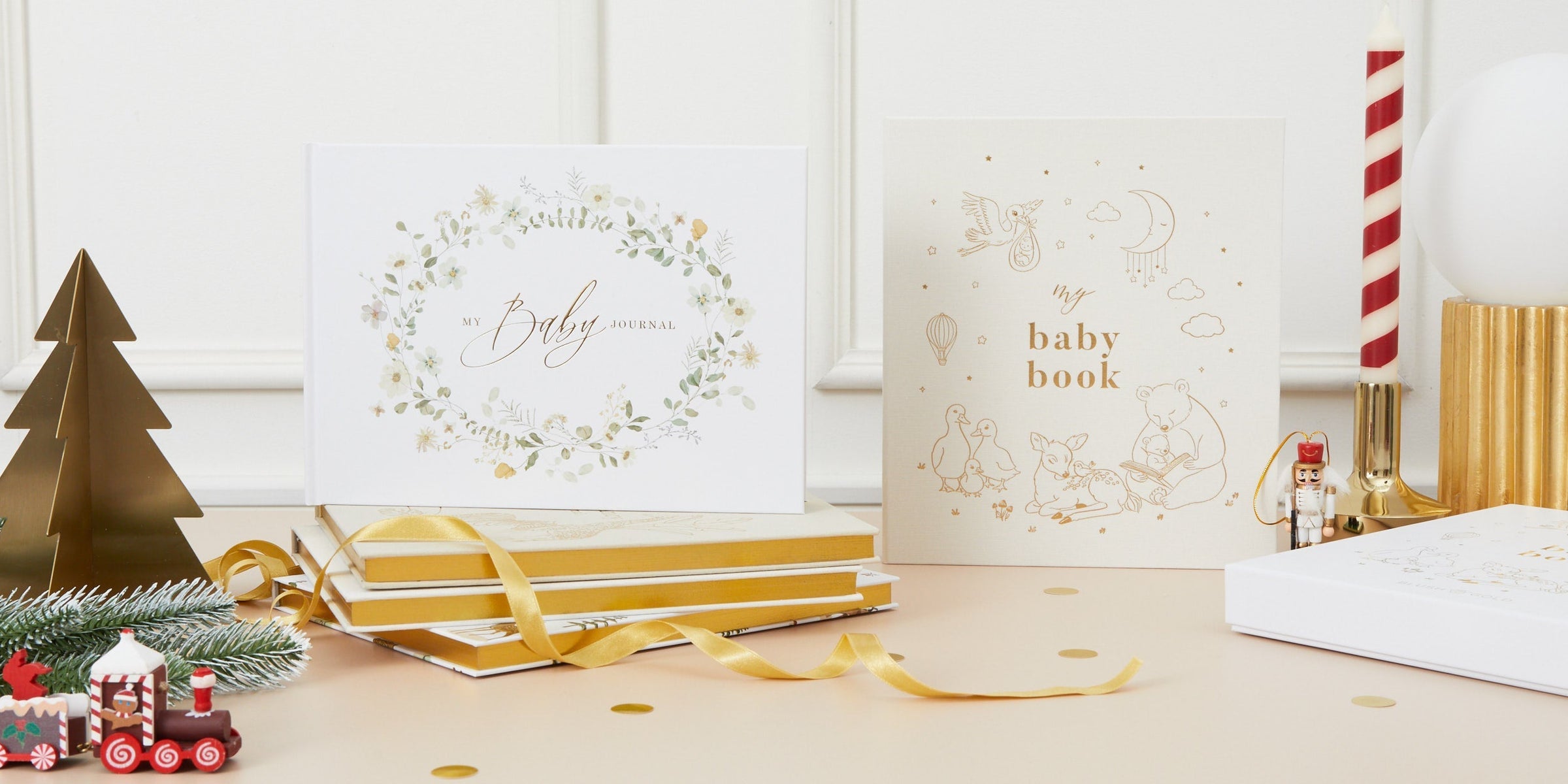 New baby memory book collection featuring Floral and Lullaby designs by Blush and Gold