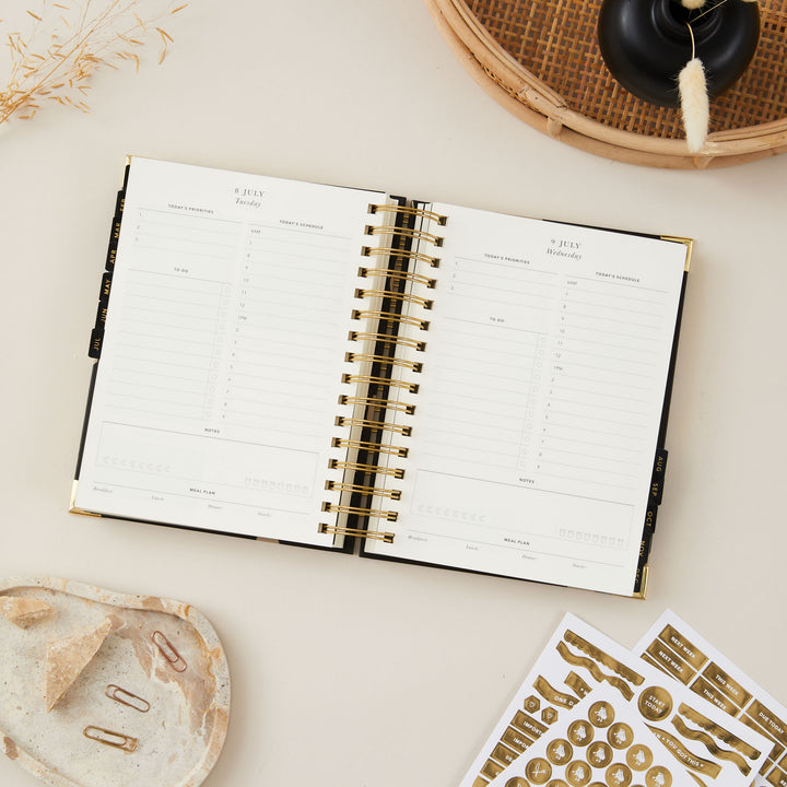 2025 day-to-day planner featuring a time-blocking layout, allowing for efficient scheduling and task management, with clear sections to organise the day by hours.