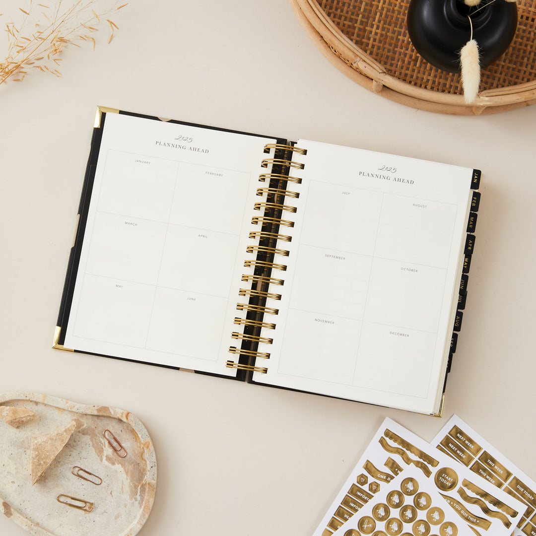 2025 yearly overview page in the planner, displaying the entire year at a glance with neatly arranged months, perfect for long-term planning and important date tracking.