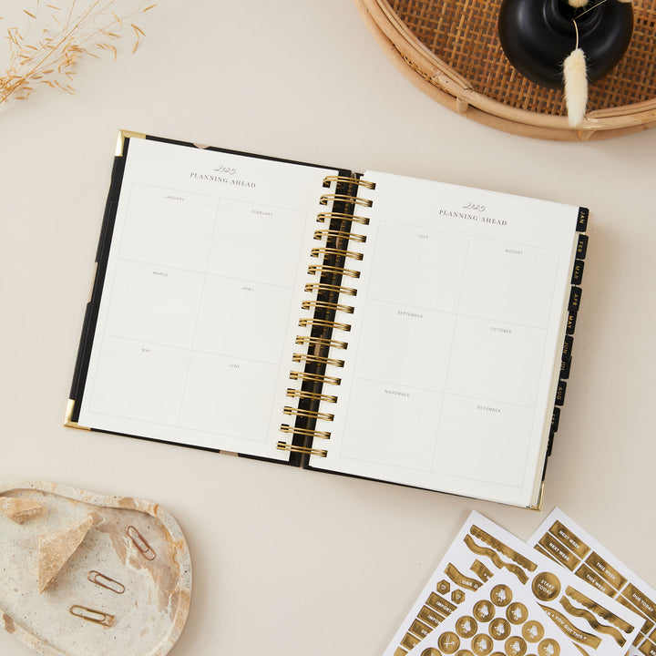2025 yearly overview page in the planner, displaying the entire year at a glance with neatly arranged months, perfect for long-term planning and important date tracking.