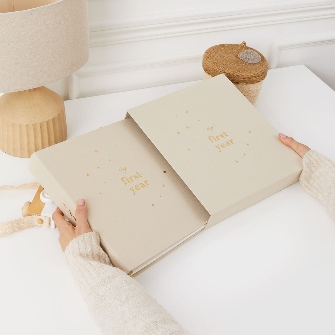 Gender-neutral baby photo album with a simple and elegant design, perfect for storing and celebrating precious baby memories.