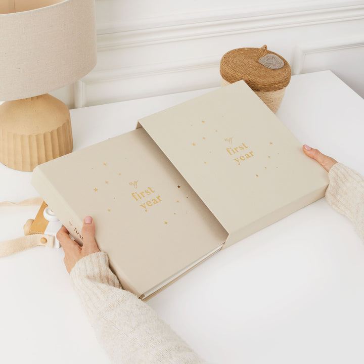 Gender-neutral baby photo album with a simple and elegant design, perfect for storing and celebrating precious baby memories.
