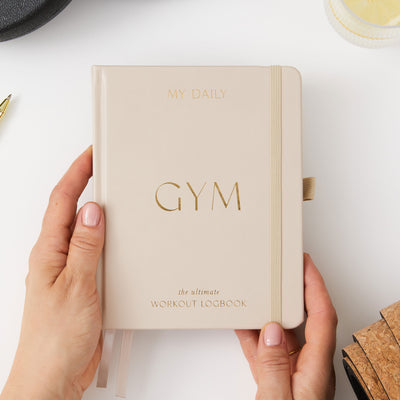 Beige gym planner for tracking workouts and weight loss goals