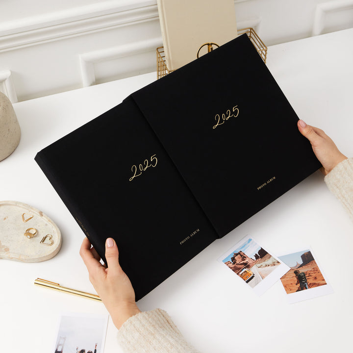 Blank 2025 photo album with gold accents, the perfect gift for capturing memories this holiday season.