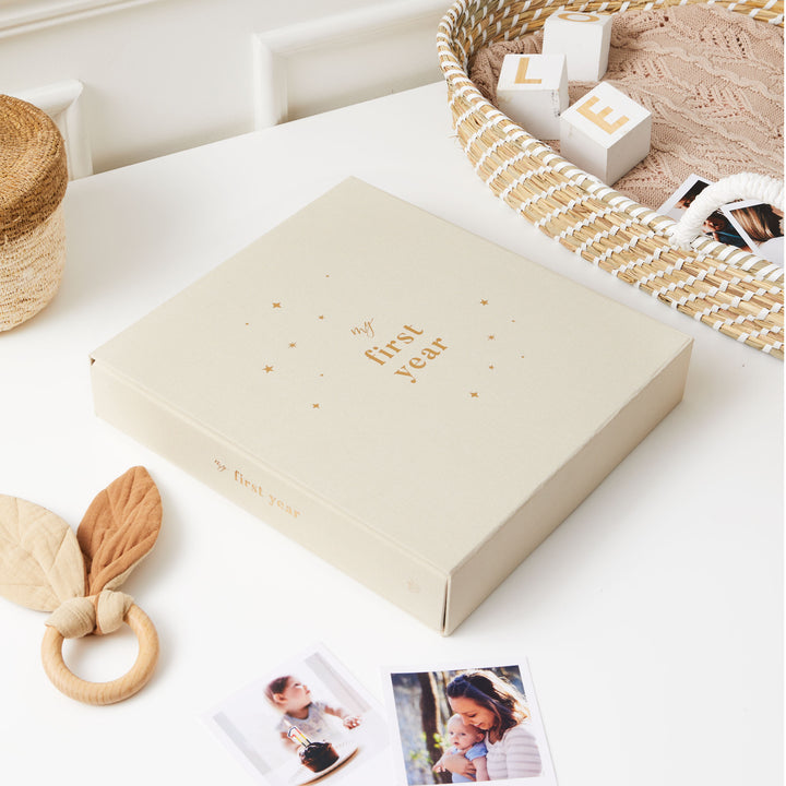 Blank baby photo album designed to capture and preserve first-year memories, with a simple and timeless design.