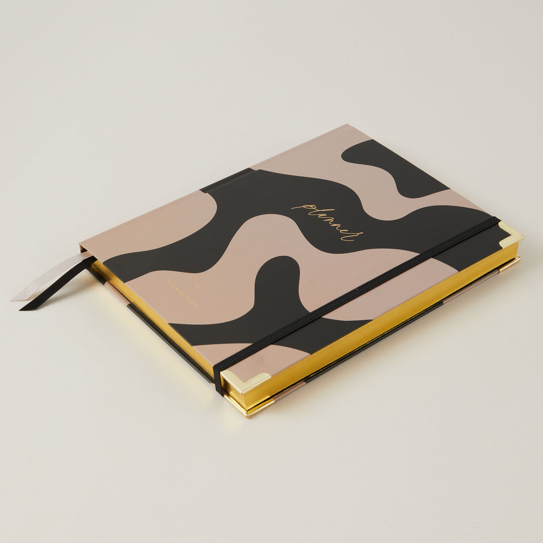 Weekly undated planners and notebooks