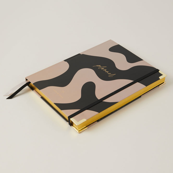 Weekly undated planners and notebooks
