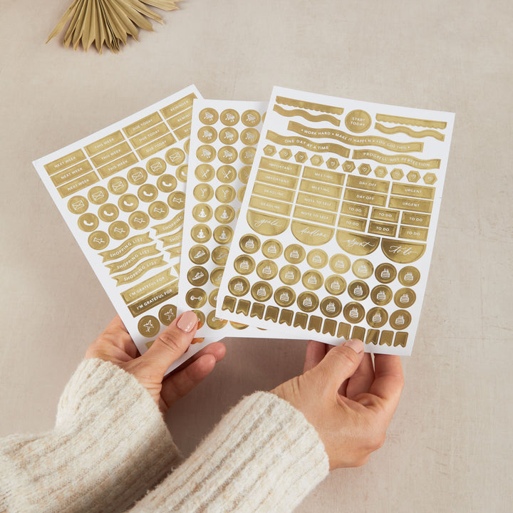 2025 planner with a stickers, designed for daily organisation with time-blocking and to-do lists, along with a weekly overview for goals and habit tracking.