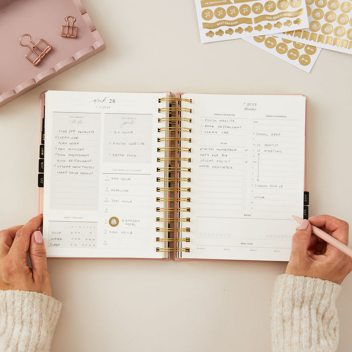Day-to-day planner page for 2025 featuring schedule time blocking, meal planning, and a to-do list section for detailed daily organisation.