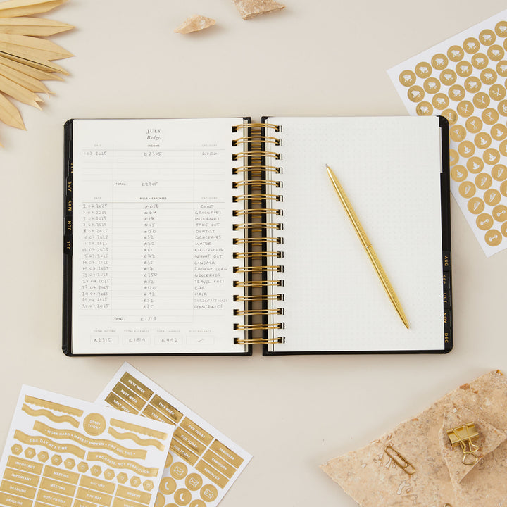 2025 daily planner with tabs for easy navigation and organised planning throughout the year.