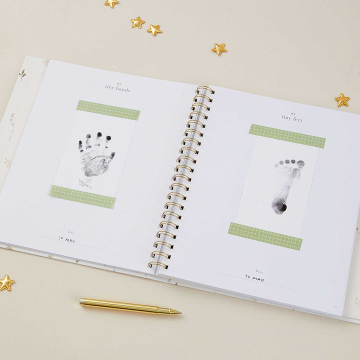 Delicate floral baby keepsake book with foiled details, gender-neutral design for new parents.