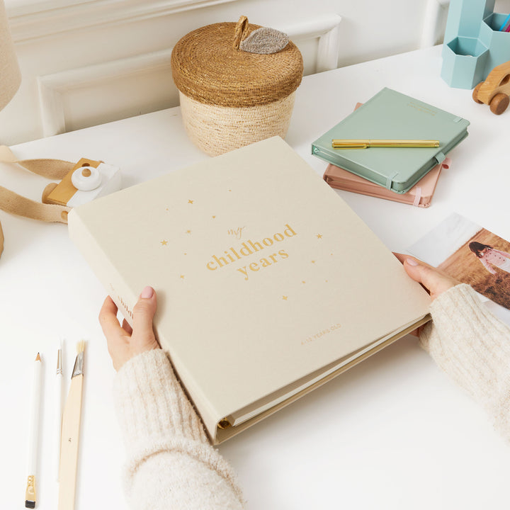 Gender-neutral, minimalist photo album with a sleek design, perfect for preserving cherished memories in a timeless and elegant way.