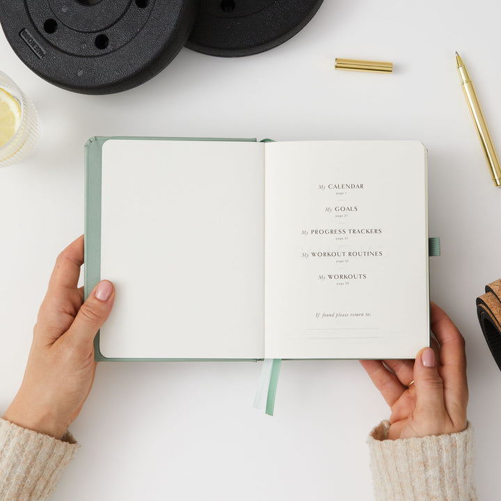 Light green fitness journal for setting and achieving goals