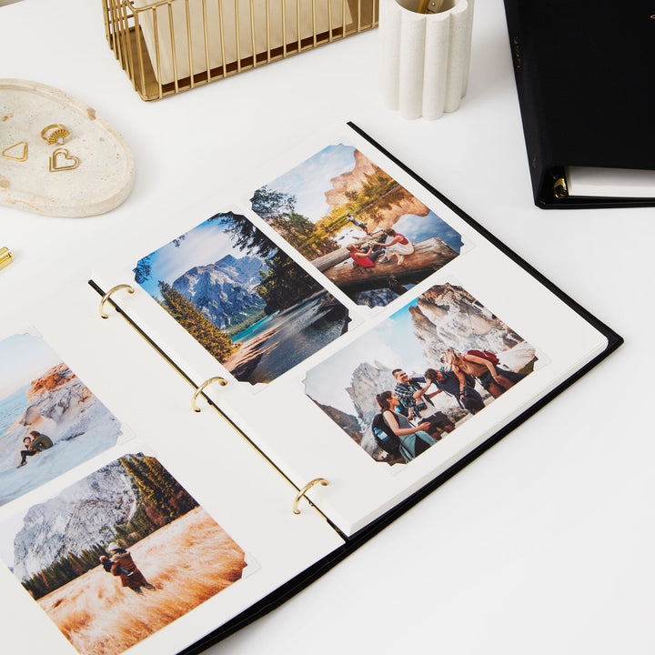 Luxury photo album for 2025, adorned with gold details and blank pages, perfect for preserving special memories.