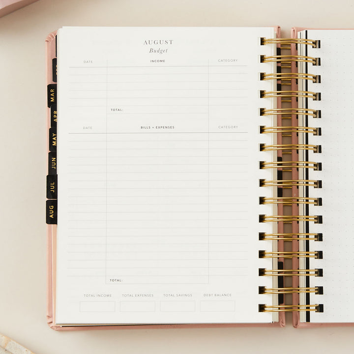 Monthly budget page in the 2025 planner with sections for tracking income, bills, and expenses for efficient financial planning.