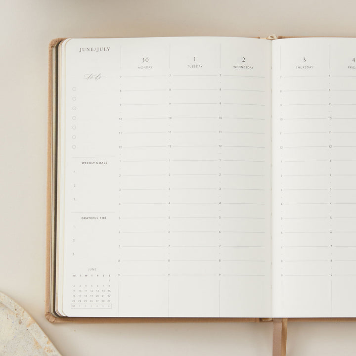 Planner for 2025 featuring a vertical layout, with equal space for all seven days of the week for balanced scheduling.