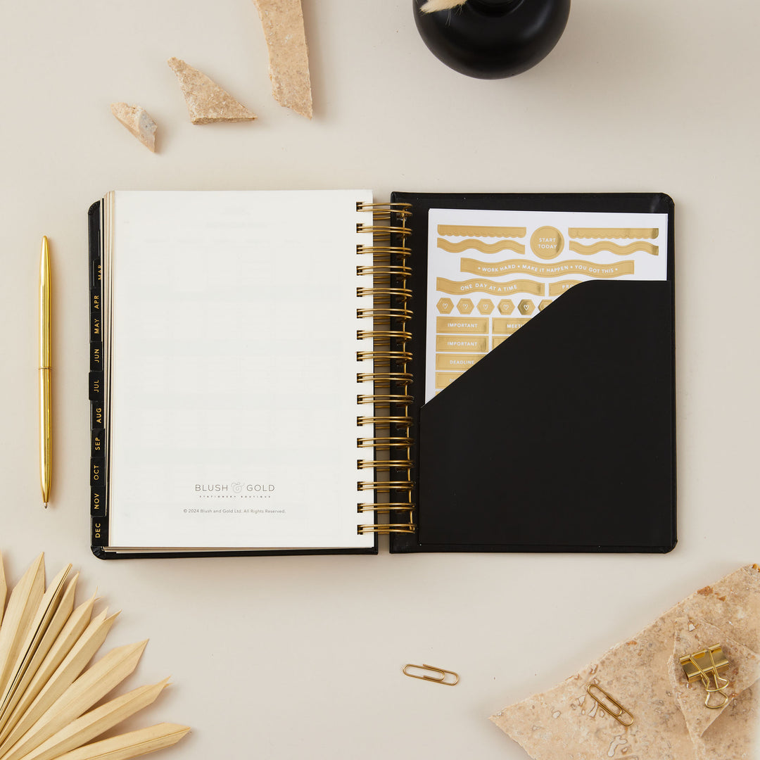 Sleek black vegan leather 2025 daily diary with beautiful gold foil details, perfect for staying organised in style.