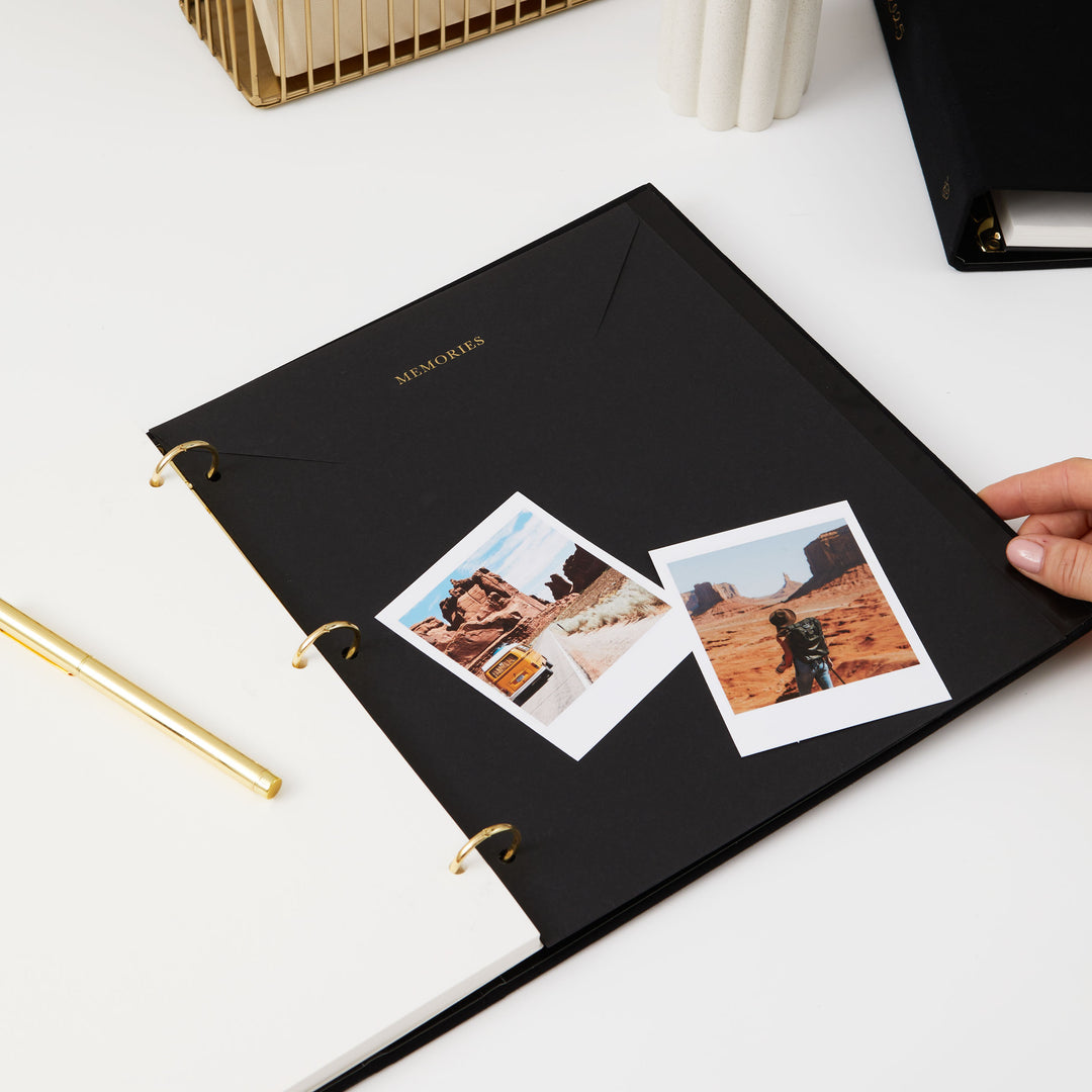 Stylish 2025 photo album featuring blank pages and opulent gold details, a perfect Christmas keepsake.