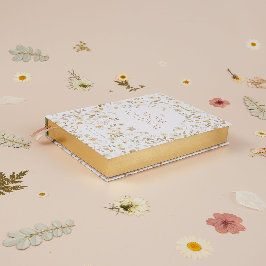 Undated mom journal with wildflower illustrations and room to write the same day across five years