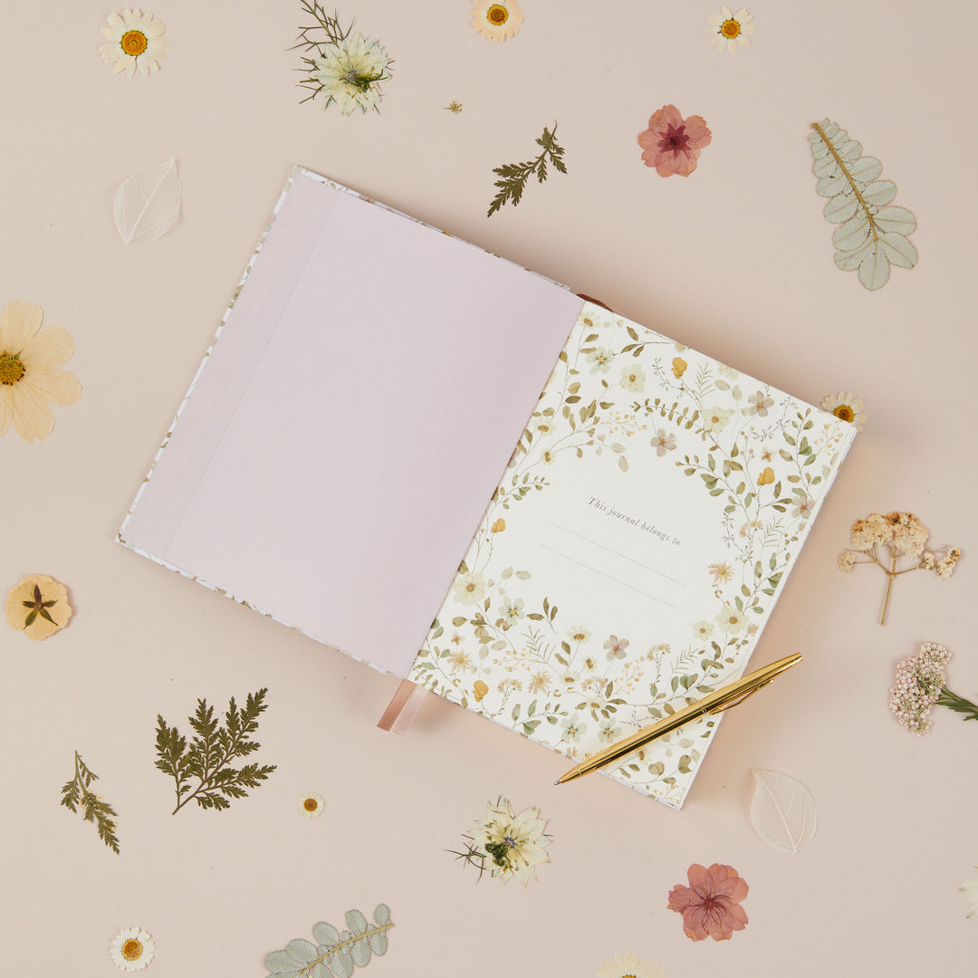 Undated mum journal with wildflower illustrations and room to write the same day across five years