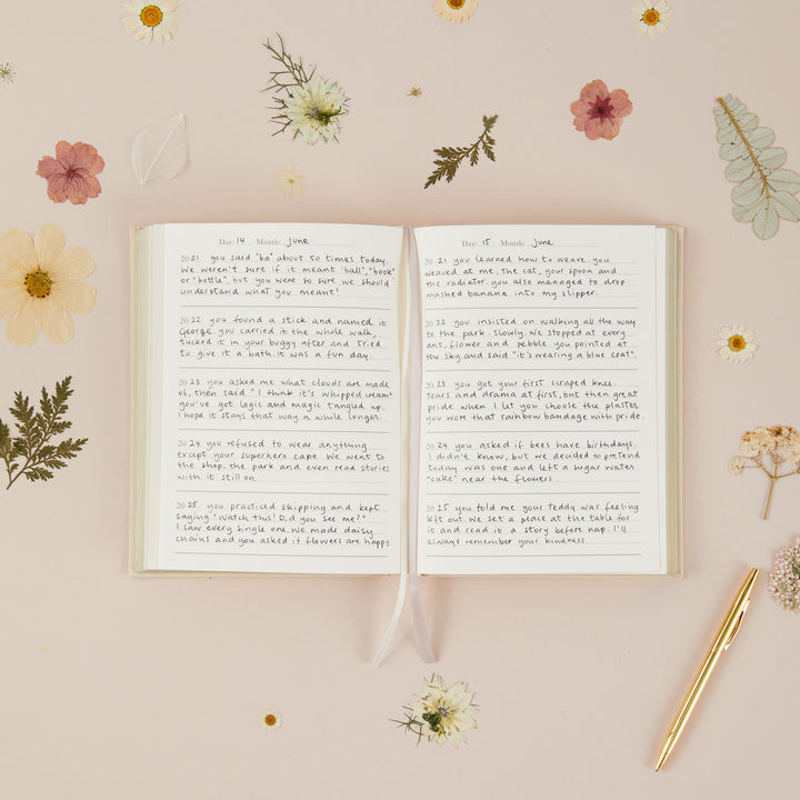 Five year mom journal with watercolor floral details designed to capture everyday motherhood moments