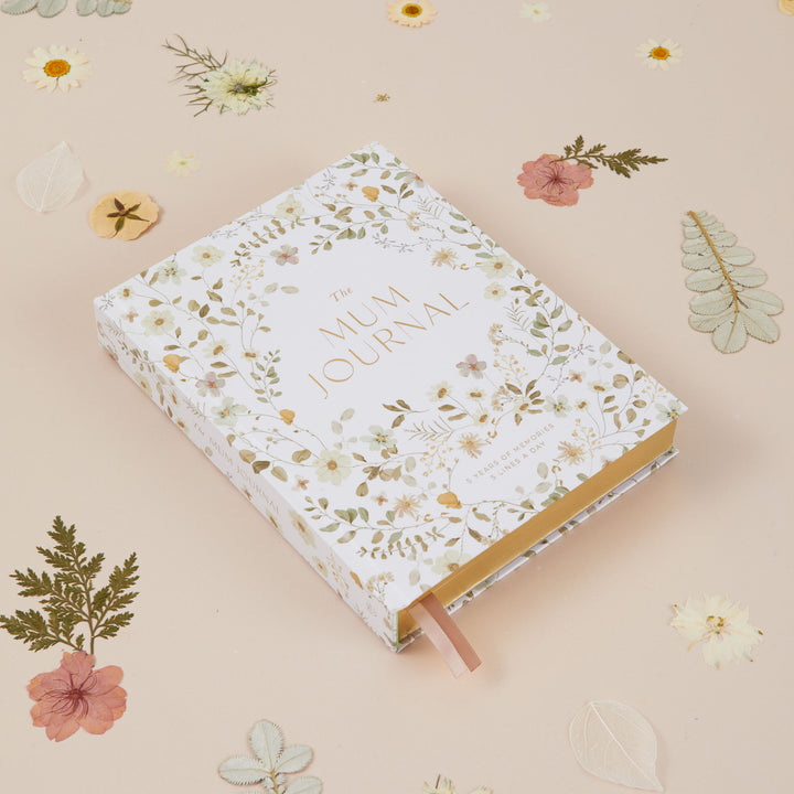 Five year mum journal with watercolour floral details designed to capture everyday motherhood moments