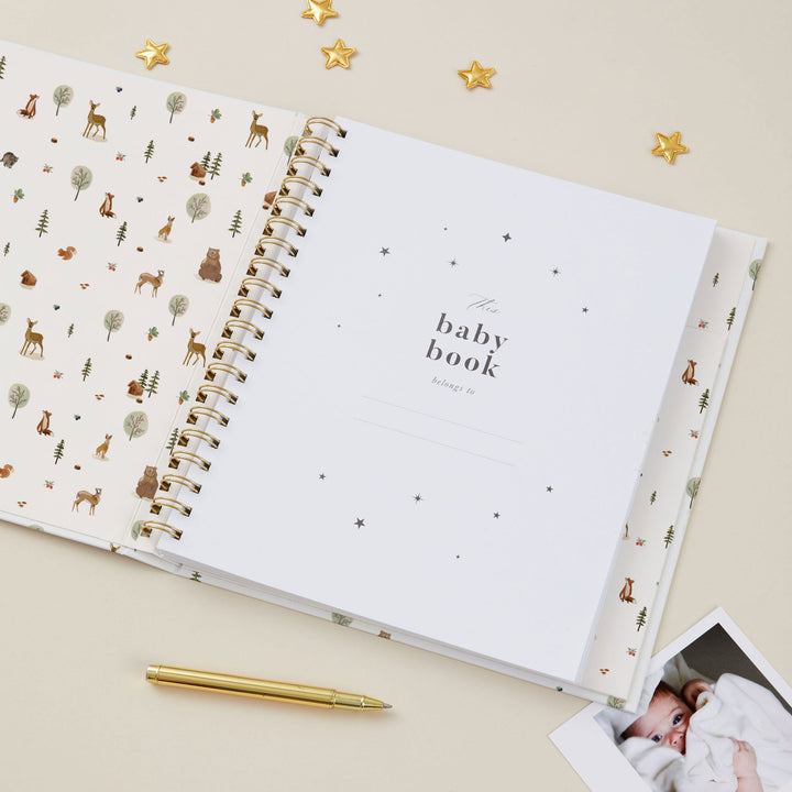 Woodland baby milestone journal with bears, squirrels and reindeers.