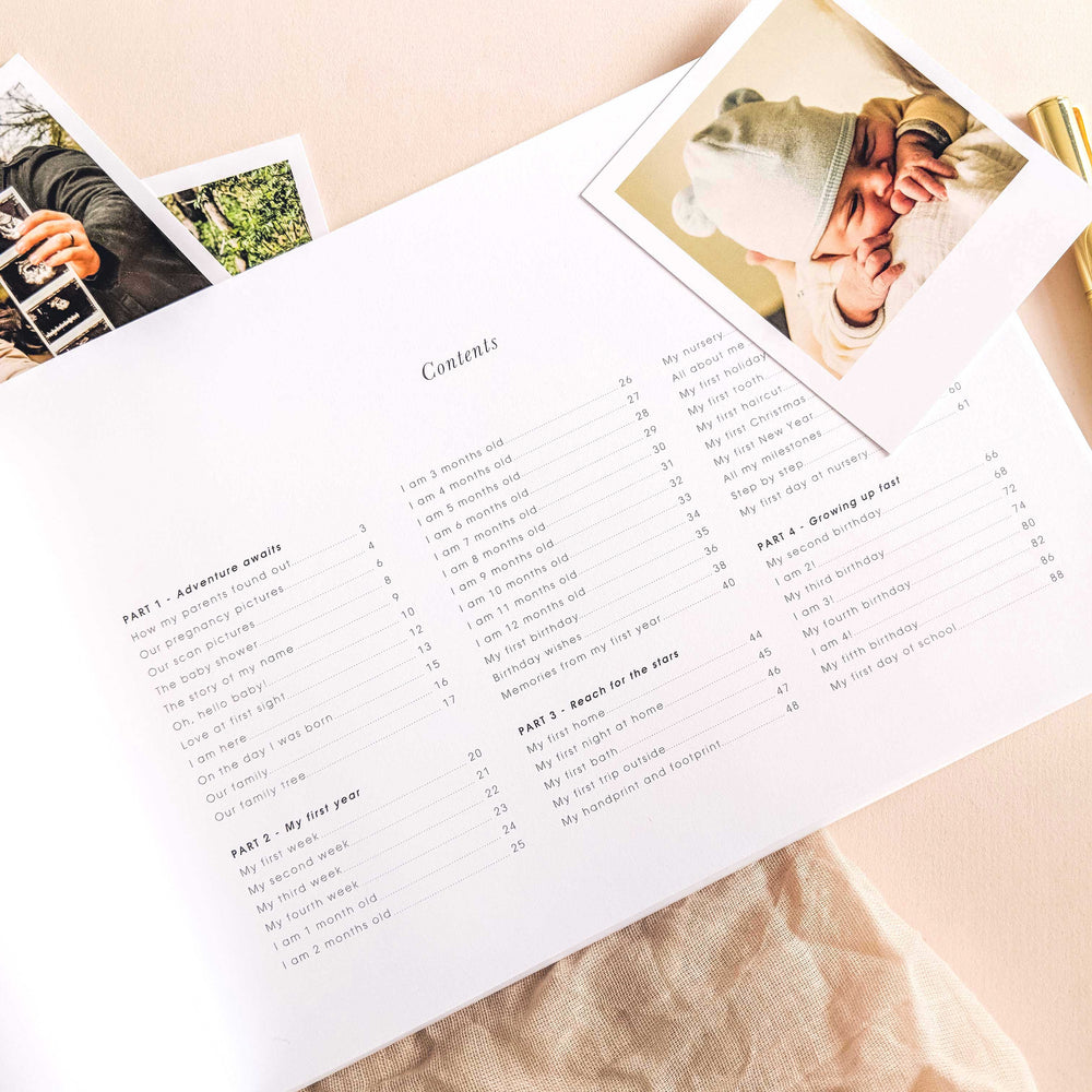 List of sections on the contents page, including 'Baby Arrival,' 'First Weeks,' 'Milestones,' 'First Birthday,' and 'Special Memories'.