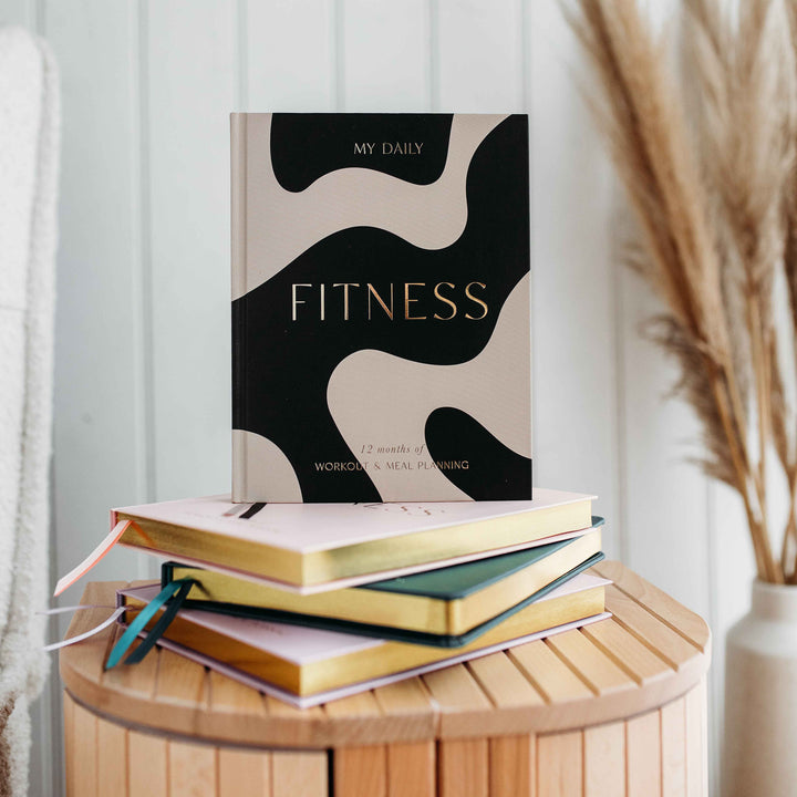 Daily workout planner page filled with home workout schedule