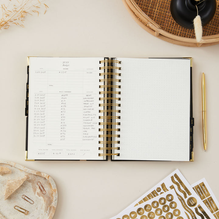 2025 daily diary featuring a dedicated monthly budget page, allowing for easy tracking of expenses and financial planning alongside daily tasks and goals.