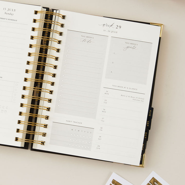 Close-up view of the weekly layout in a 2025 daily planner, showing neatly organised sections for each day, ideal for structured planning and task management.