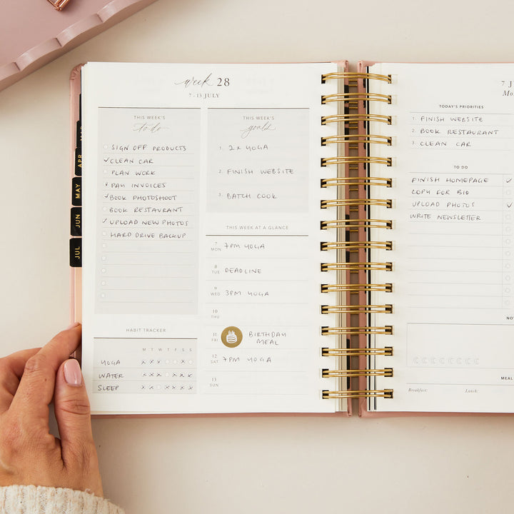 Weekly overview page of the 2025 daily planner featuring sections for priorities and to-do lists, designed for organised planning.