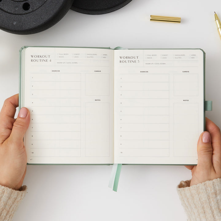 Compact light green workout planner for tracking sets and reps